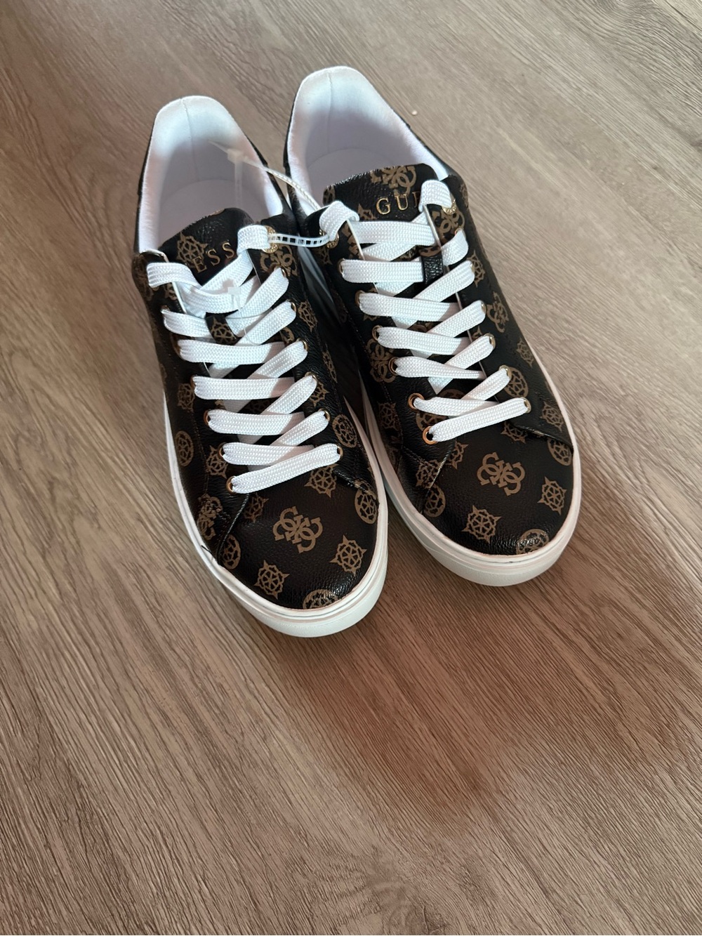 Guess Men’s Black Sneakers with Gold Monogram Accents